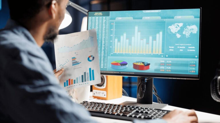 Looking at charts and graphs on a screen